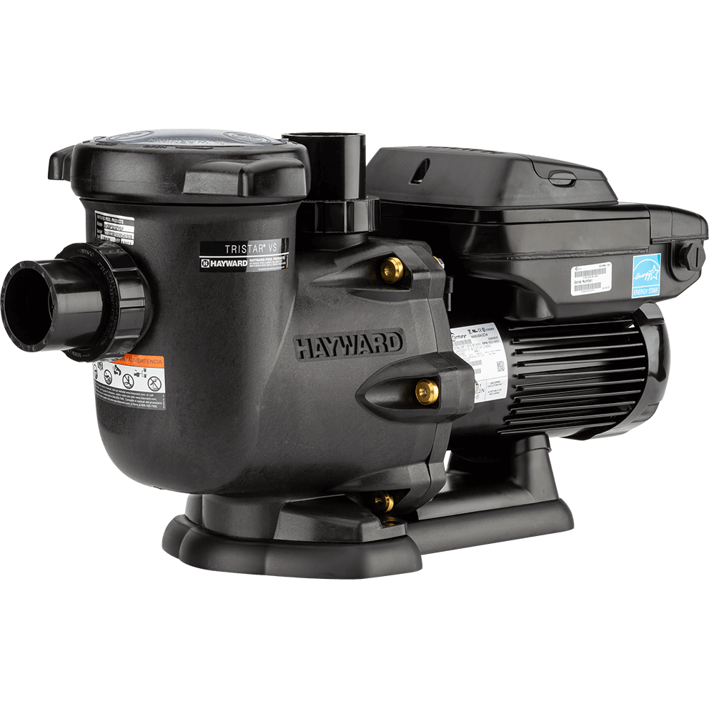 Angled front three quarter view of the Hayward TriStar VS Variable-Speed Pool Pump, isolated on a transparent background, showing the suction side connection prominently. A large threaded union port projects toward the left edge from the strainer pot, while the round strainer lid sits above with two opposing side tabs. The wet end housing in the centre shows raised “HAYWARD” lettering, brass toned inserts, and multiple fasteners around the clamp ring. The vertical discharge outlet rises behind the wet end near the top centre. To the right, the TEFC motor extends horizontally with deep cooling fins, a white specification label on the side, and a large circular rear fan cover with vent slots. The broad black base rail supports the entire assembly with rounded feet and a slightly arched mid support beneath the motor.