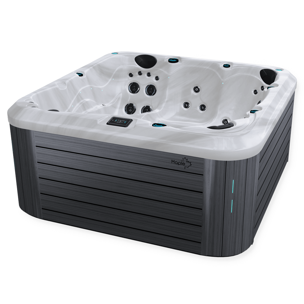 Angled view of a Maple Spas M620 hot tub featuring a sleek, modern design with a sterling white marbled acrylic interior, ergonomic seating with multiple hydrotherapy jets, and a dark horizontal slat exterior cabinet accented by LED lighting and a digital control panel.