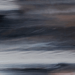 Hot tub shell colour option named Midnight Canyon, featuring a dramatic swirl of deep black, navy, and rich brown tones accented by streaks of silver and pearl. The high-contrast, layered design evokes the look of a rugged canyon landscape under moonlight.
