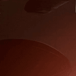 Hot tub shell colour option named Moulin Rouge, featuring a deep, glossy red surface with rich burgundy undertones. The high-shine finish reflects light for a bold and luxurious appearance, evoking a sense of drama and elegance.