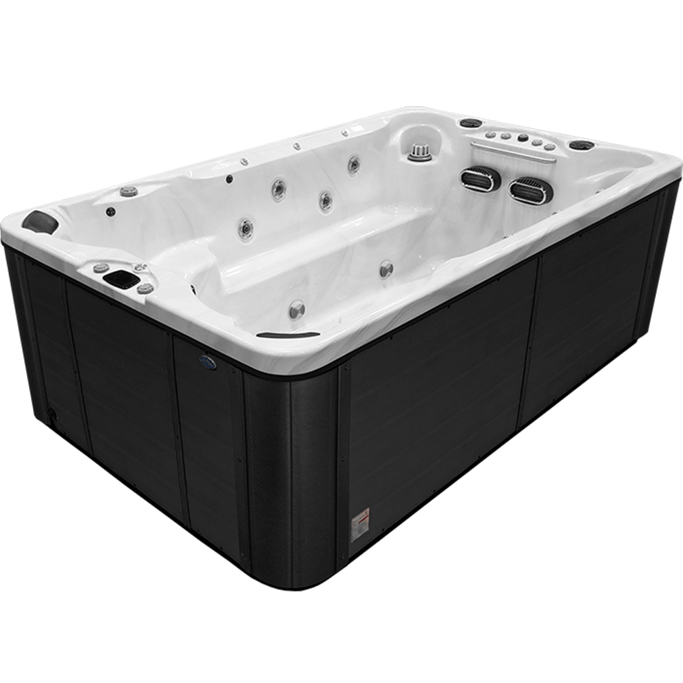 Angled side view of the Cal Spas Swim-Pro F-1325 swim spa. This entry-level fitness model features a sleek white acrylic interior and dark-paneled exterior. Two powerful river jets are positioned at one end to provide adjustable resistance for aquatic exercise. The interior includes fitness handlebars, foot jets for soothing massage, and bench-style seating along the sides for companions to join during workouts. The Swim-Pro F-1325 is a popular choice for low-impact training and hydrotherapy.