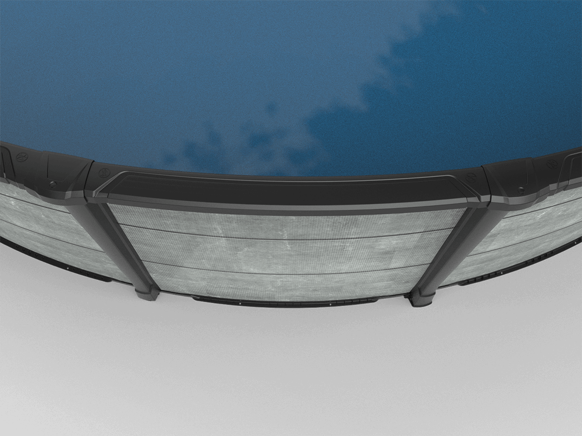 A detailed close-up of the Carvin Newtown Above Ground Pool’s top edge, focusing on the black top rail and surrounding hardware. The sturdy, angular design of the rail offers both function and style, contrasting against the bright blue water within. This angle highlights the precision of the pool’s construction and the high-end finish of the black rail system.