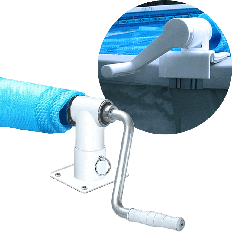 Image of a solar cover reel system designed for above ground pools. The reel consists of a white metal base with a mounted, curved handle used to manually roll and unroll a solar blanket. A section of the rolled-up solar cover is visible, attached to the horizontal bar of the reel. Inset in the top right corner is a close-up showing the reel handle securely fastened to the pool’s top rail, demonstrating how the system attaches for convenient use.