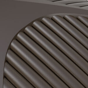 Mocha finish option with Darling roof type for the Covana Oasis automated hot tub cover. The image showcases a close-up of the Darling-style roof featuring curved, horizontal ridges arranged in a sleek, vented pattern. The surface is finished in a deep mocha brown with a subtle pebble-textured sheen, enhancing both grip and visual richness. The rounded contours of the roof design create a modern, sculpted appearance, while the uniform spacing of the raised segments contributes to effective water runoff and visual symmetry. This finish and style pairing conveys warmth, sophistication, and architectural elegance.