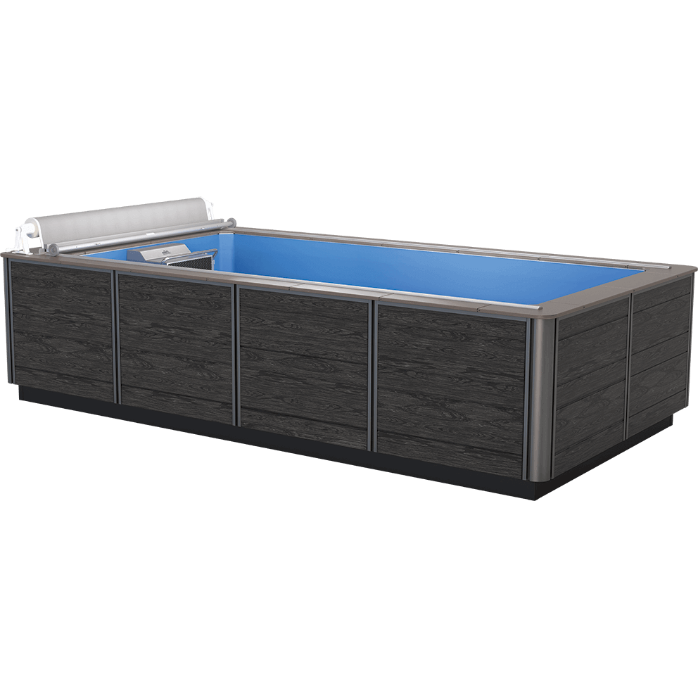 Endless Pools EP407 Plus Modular Pool shown above ground with a rectangular 7-foot by 14-foot swim area. Exterior panels feature a sleek dark wood-grain finish bordered by silver-toned vertical trim, with a smooth metallic coping around the pool edge. At one short end, the integrated Hydrodrive Plus propulsion housing and retractable roller cover are visible, designed for easy opening and closing.