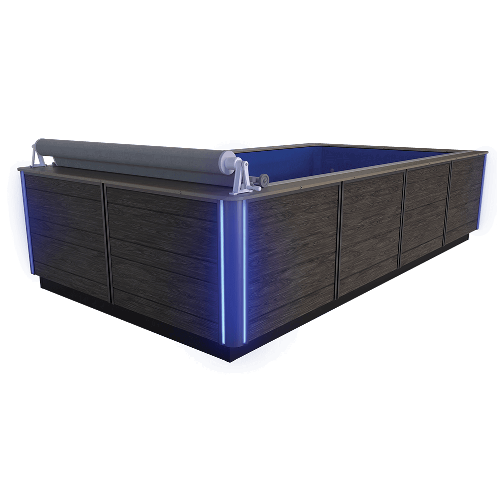 Endless Pools EP508 Pro Modular Pool captured from the rear-right corner, showing the back and right exterior sides. The same dark wood-effect horizontal panel design is segmented by brushed-aluminium vertical trim. Both visible corners have integrated blue LED lighting strips extending vertically. The retracted silver cover roller, mounted above the rear swim end, is supported by white metal brackets and aligned parallel to the brushed-aluminium coping. The bright blue interior contrasts with the dark exterior, with the rear-mounted Hydrodrive™ Pro swim current system partially visible through the open water-facing end.