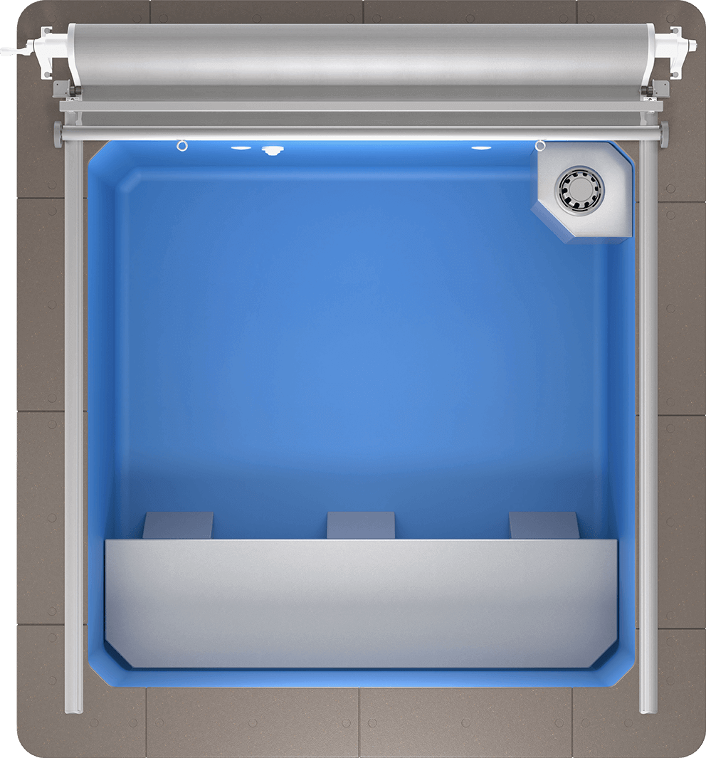 Endless Pools Plunge Mini Therapy Pool top-down view showing the square, 7-foot by 7-foot blue interior shell surrounded by black wood-grain cabinet panels. The rear edge holds a silver manual roller cover system spanning the pool’s width. In the top-right corner, a grey angled housing contains a circular intake vent, while two small round lights and one circular jet are mounted along the back wall. Three evenly spaced grey footrests line the opposite wall, set against the smooth blue floor.