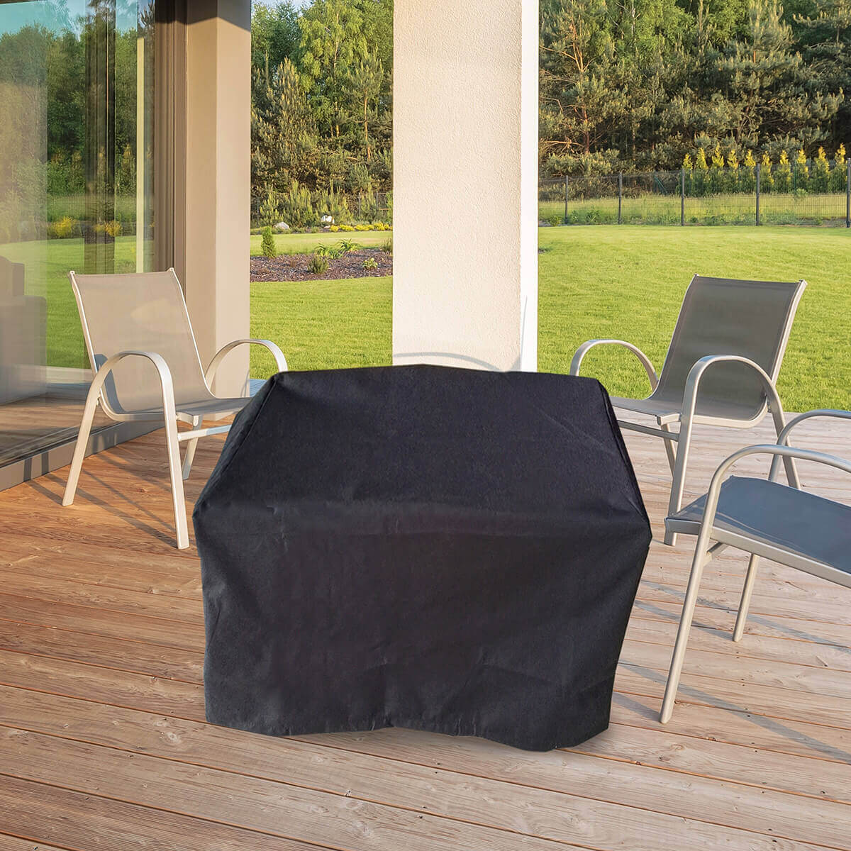 A protective black fitted cover draped over the Sunbeam Fabia Fire Table, fully concealing its square silhouette. The cover fits tightly over the flat tabletop and descends straight to the deck surface, shielding the entire aluminium structure from the elements. Set on a sunlit wooden deck next to light grey mesh patio chairs, the covered form emphasises the fire table’s weather protection features and included cover accessory.