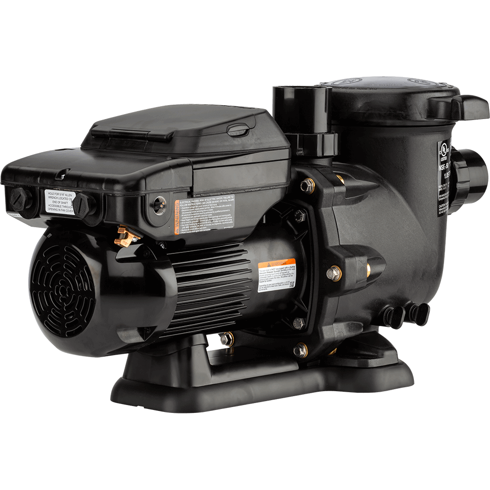 Angled rear three quarter view of the Hayward TriStar VS Variable-Speed Pool Pump, isolated on a transparent background, looking from the motor end toward the wet end. The circular motor fan cover sits at the far left with curved vent slots, while the motor body extends diagonally toward the right with deep cooling fins and a long control enclosure on top, its lid closed. The clamp ring and volute joint sit near the centre with multiple hex head bolts around the perimeter and brass toned inserts tucked into the housing pockets. The strainer pot rises at the upper right with its round lid and side tabs, and the broad base rail runs beneath everything with a raised arch under the motor.