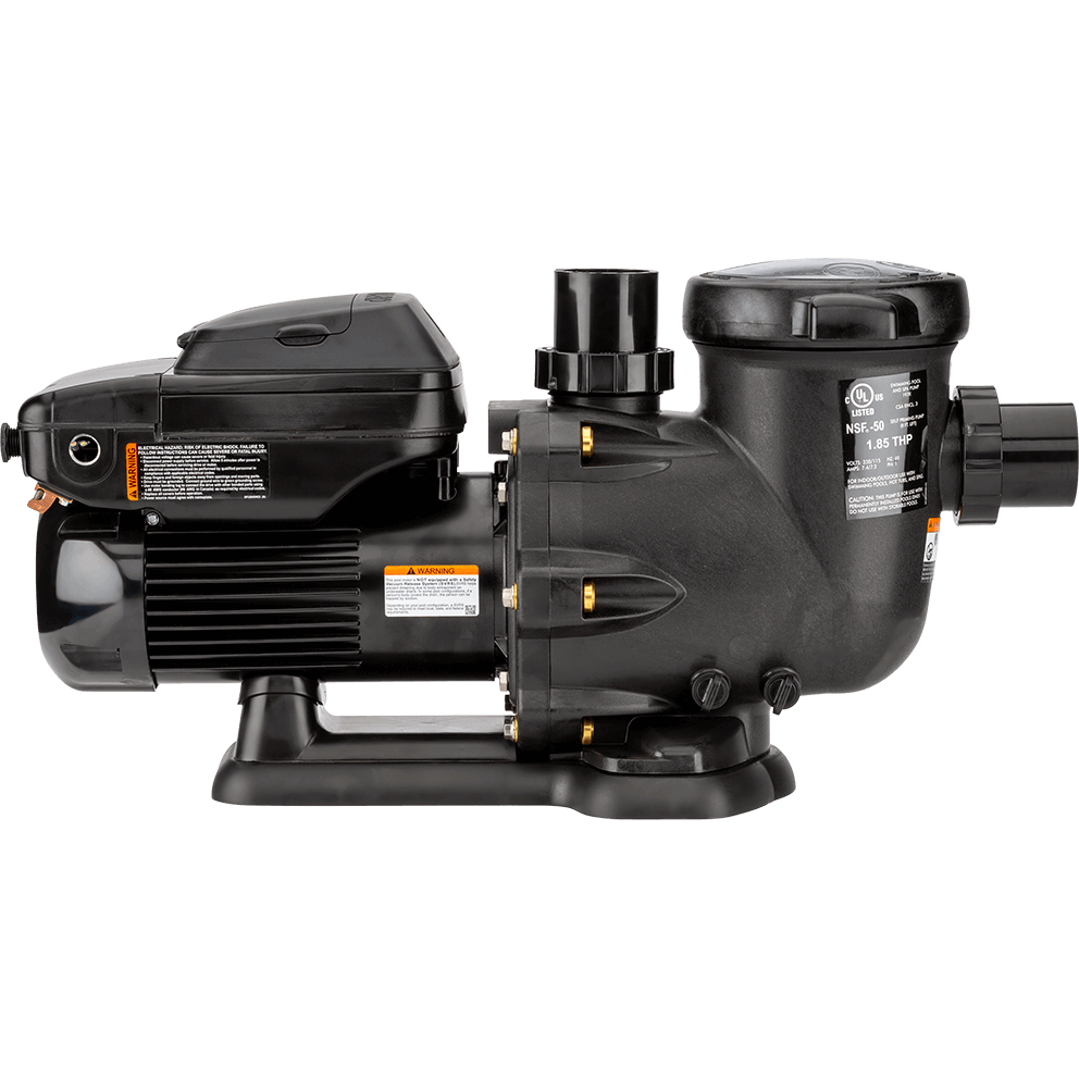 Side profile view of the Hayward TriStar VS Variable-Speed Pool Pump, isolated on a transparent background, with the motor on the left and the wet end on the right in a straight horizontal layout. The motor body shows evenly spaced cooling fins and a closed control enclosure on top, tapering slightly toward the left end bell. The volute and clamp ring sit mid right with visible fasteners and brass toned inserts. The strainer pot rises at the top right with a round lid and side tabs, and a large threaded union port projects out to the far right. The entire assembly sits on a single black base foot with rounded ends and a central support arch beneath the motor.