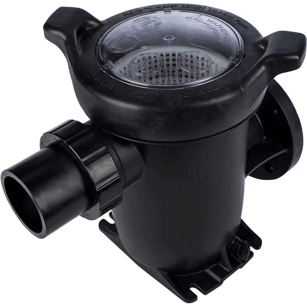 Close angled product image of the Hayward TriStar XL strainer housing shown isolated on a transparent background, viewed from the front left at a slight downward angle. The tall cylindrical strainer basket is topped with a clear see through lid featuring moulded instructional markings and directional arrows, secured by two large integrated locking handles positioned on opposite sides. A horizontally oriented threaded intake union extends from the left side of the strainer housing, while the lower housing tapers inward toward the reinforced base. The image highlights the oversized basket capacity, smooth internal contours, and corrosion resistant black housing designed to reduce cleaning frequency and simplify maintenance.