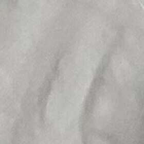 Close-up view of the Smoky Mountain acrylic colour option for Maple Spas hot tubs, displaying a cool blend of misty grey and soft white tones with subtle charcoal veining. The surface features gentle, flowing marble-like patterns that drift diagonally across the panel, creating a natural stone-inspired appearance. Light and dark grey variations add depth and dimension, while the glossy acrylic finish reflects light evenly, enhancing the smooth, contemporary aesthetic of the spa interior.