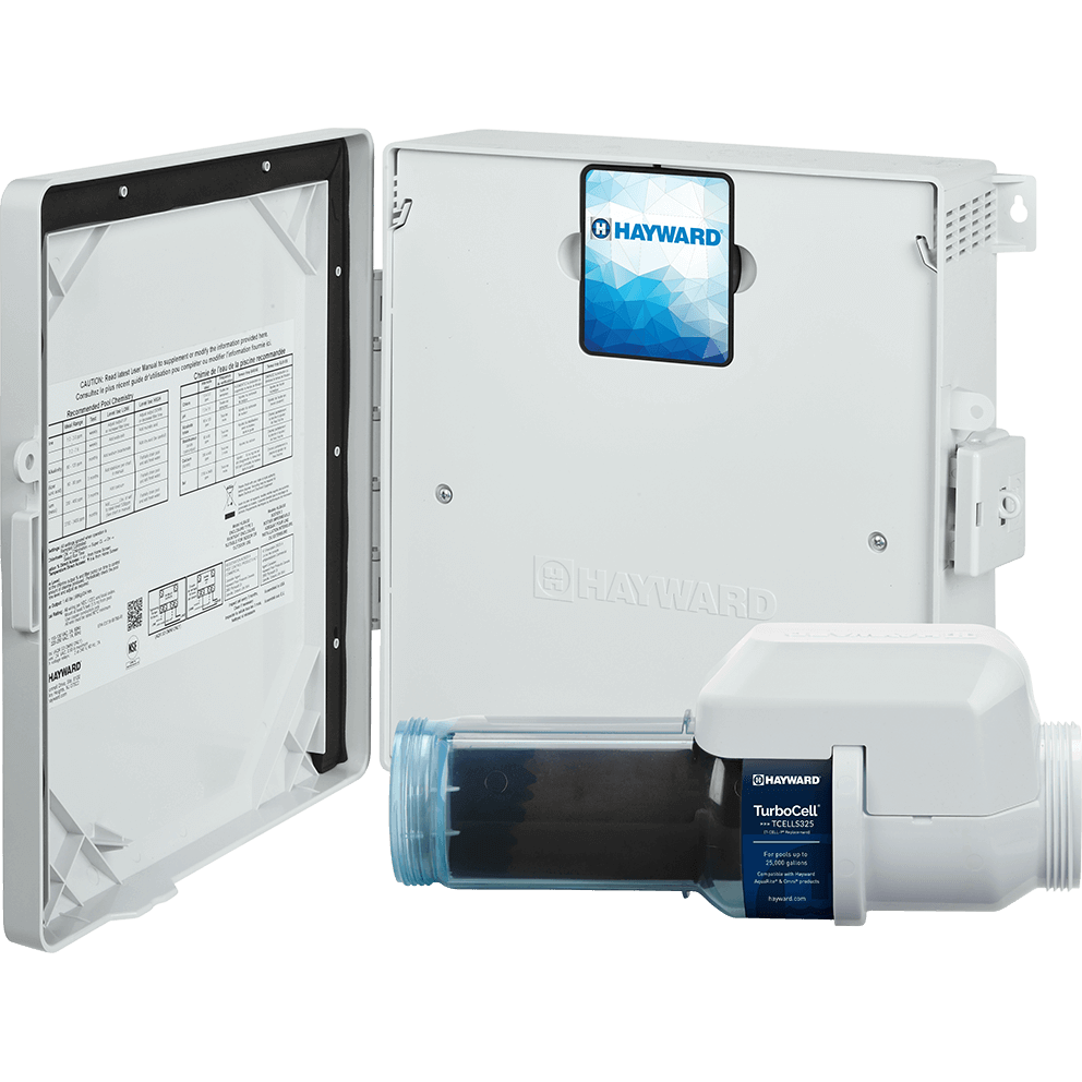Front facing view of the Hayward AquaRite S325 Omni 25k Gallon System on a transparent background, showing the white AquaRite S3 Omni control enclosure with the door swung open to the left and the TurboCell S325 clear salt cell placed horizontally across the lower foreground. The open door sits on the far left with a black gasket border and a large white printed instruction label inside, while the main enclosure body fills the right side with a small square Hayward branded panel near the top centre and an embossed HAYWARD logo across the mid lower area. Along the bottom, the TurboCell S325 runs left to right with a clear blue threaded union on the left end, a transparent housing revealing dark internal plates, and a white end cap on the right with a large white threaded connector; a cream coloured power cable exits from the top of the white cell head and arcs down and left across the foreground. A dark blue product label band wraps around the centre of the cell near the white end cap.