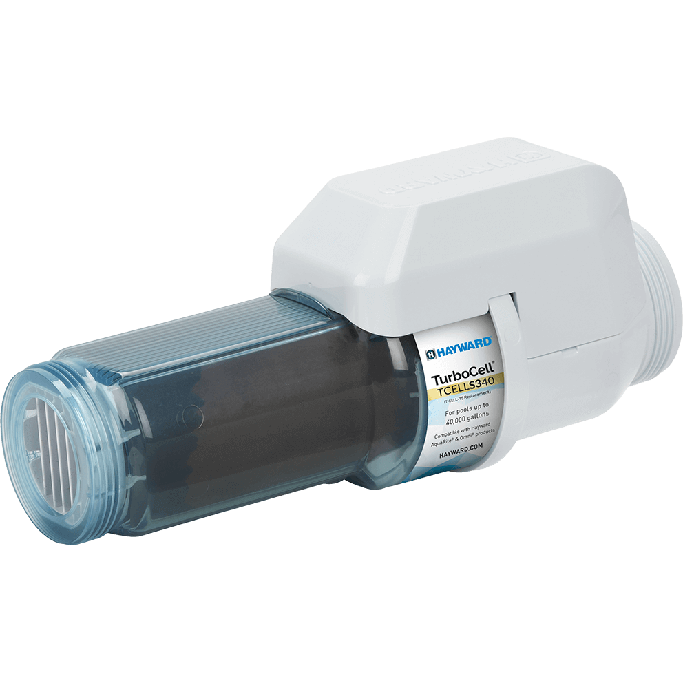 Angled three quarter view of the Hayward TurboCell S340 40,000 Gallons Clear Salt Cell (TCELLS340), shown on a transparent background and rotated so the translucent blue tinted chamber runs from left to centre and the white housing sits to the right. The “TurboCell TCELLS340” label is clearly visible on the housing side facing the viewer, with the Hayward logo above and smaller compatibility text below. The clear chamber reveals the dark electrode stack inside, and the top surface shows fine ribbing that runs lengthwise. The leftmost threaded connection collar is angled toward the viewer, while the rightmost white threaded outlet extends outward and slightly upward.