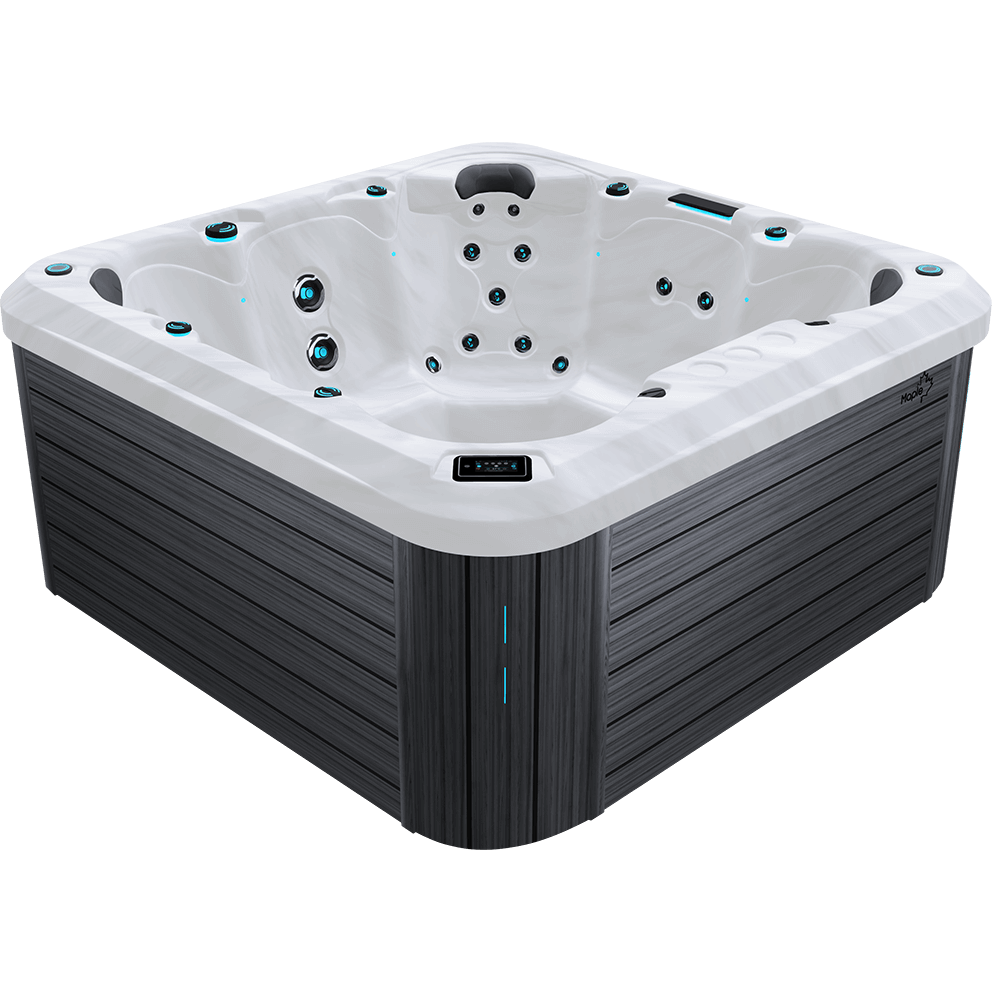 Angled front three-quarter view of the Maple Spas M850 Large 7-Person Hot Tub shown isolated on a transparent background, featuring a white marbled acrylic shell framed by a grey horizontal-grain cabinet. The spa interior is visible from above and the front corner, revealing multiple contoured seating positions arranged around a central footwell. Each seat contains precisely positioned hydrotherapy jets with illuminated blue LED rings, including clustered back jets, mid-back jets, and lower lumbar jets integrated into the moulded shell. Dark grey ergonomic headrests are mounted along the upper rim at several seating locations. A rectangular digital control panel is inset into the top lip on the front facing edge, centred above the cabinet corner, with a glossy black bezel. The exterior cabinet panels wrap around the base with a subtle vertical corner accent strip that includes a narrow vertical LED light element. The overall form highlights the spa’s angular footprint, rounded interior contours, and premium finish without any surrounding environment.