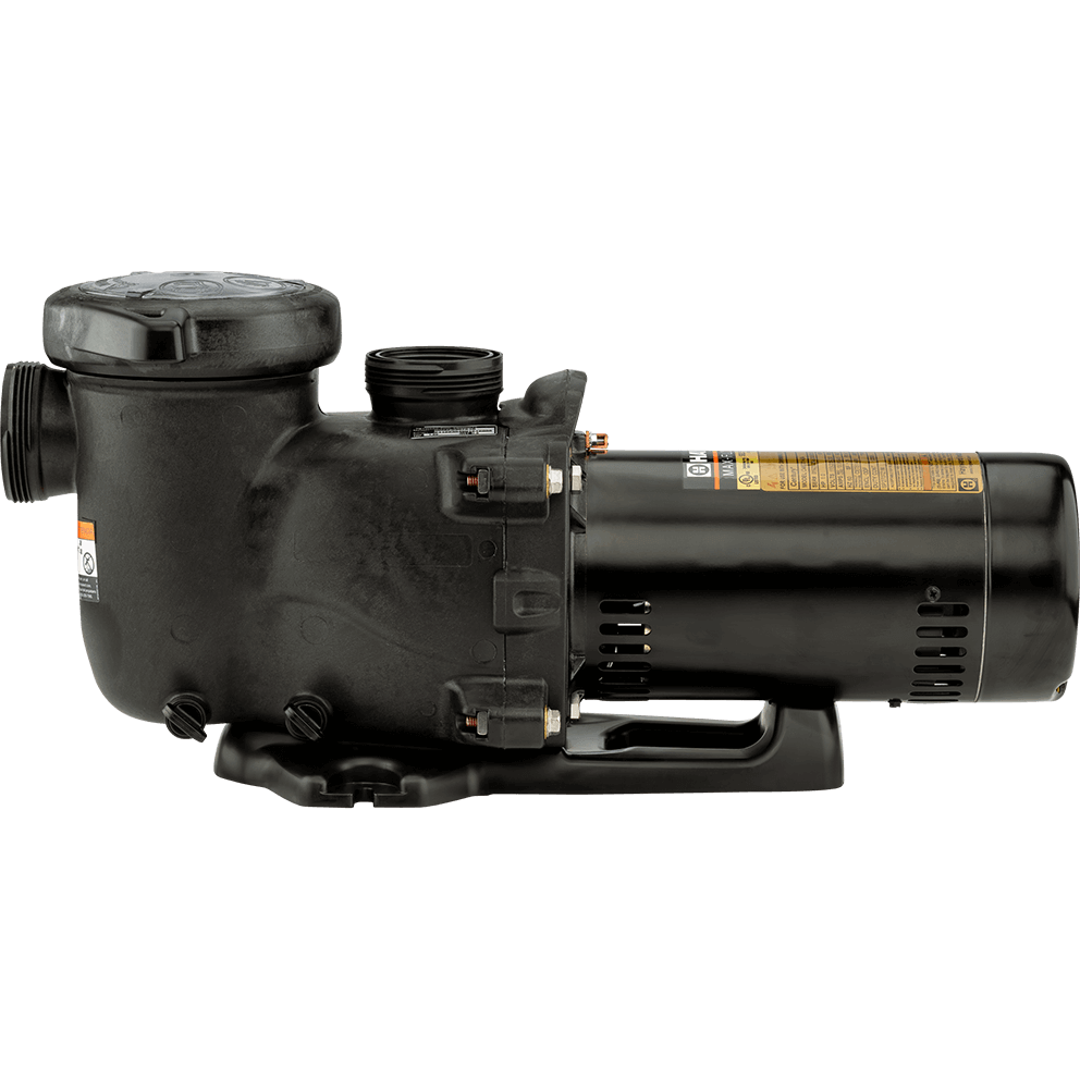 Side profile view of the Hayward MaxFlo XL Pool Pump, isolated on a transparent background, showing the full length of the unit with the strainer pot on the left and the motor on the right. A large, threaded suction port is visible at the far left edge, aligned horizontally, while the threaded discharge outlet sits on top of the wet end near the left centre, pointing straight upward. The strainer housing has rounded shoulders and a broad lid, and the motor section to the right shows vent slots near the lower portion and a long gold label running along the upper side. The pump base spans the entire length, with a recessed handle-like opening under the motor section and broad mounting feet at both ends.