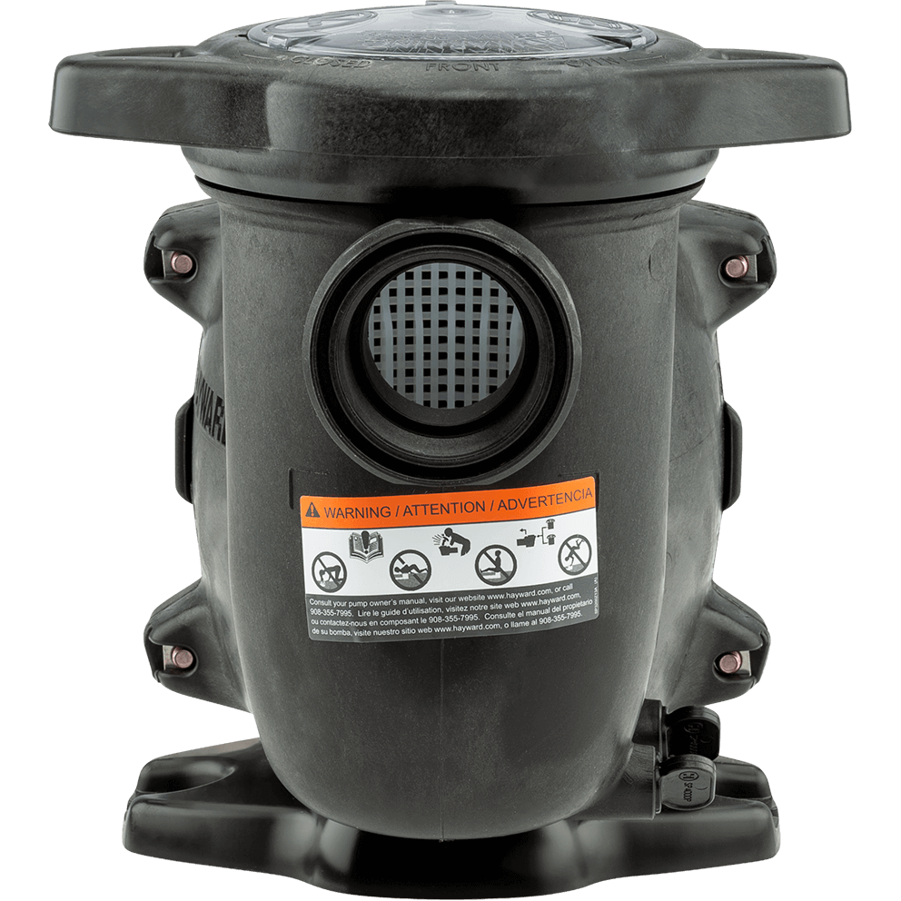 End-on view of the Hayward MaxFlo XL Pool Pump from the strainer pot side, isolated on a transparent background, centred on the large circular suction opening with the strainer basket grid visible inside. The strainer housing forms a tall rounded face with a broad lid above, and a rectangular warning label spans across the midsection beneath the suction port. The side mounting points and fasteners are visible on both left and right edges of the wet end, and the base flares outward at the bottom, creating a stable pedestal under the strainer pot.