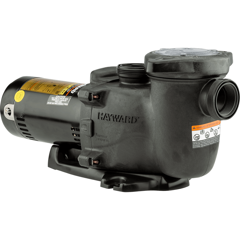 Angled three quarter view of the Hayward MaxFlo XL Pool Pump, isolated on a transparent background, showing the embossed “HAYWARD” branding on the side of the wet end. The motor sits to the left with a gold specification label along the upper side and vent slots along the lower section, while the strainer pot rises on the right with the large threaded suction port projecting straight out to the right edge. The threaded discharge outlet stands vertically on the top centre of the wet end. A warning label panel is visible on the wet end’s outer curve near the lower right, and the base shows a wide stance with a recessed opening beneath the motor section.