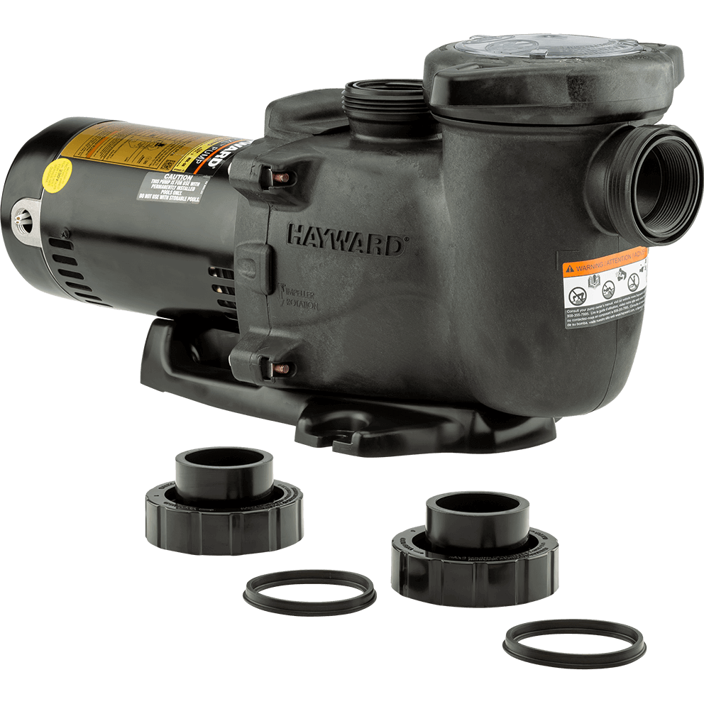 Angled three quarter view of the Hayward MaxFlo XL Pool Pump, isolated on a transparent background, with two black union fittings and two round O-ring gaskets laid out beneath the pump near the bottom centre. The motor is positioned on the left with a gold label along the upper surface, and the wet end and strainer pot sit to the right, showing the large threaded suction port facing outward to the right and the vertical threaded discharge outlet on top near the centre. The “HAYWARD” embossing is visible on the wet end’s side, and a warning label sits on the outer curve of the housing. The accessories below are arranged as two cylindrical unions placed side-by-side with the two circular gaskets separated slightly in front of them.