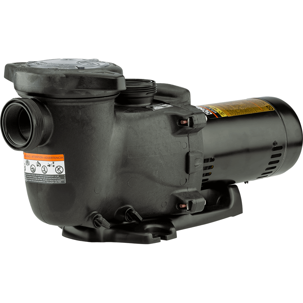 Angled three quarter view of the Hayward MaxFlo XL Pool Pump, isolated on a transparent background, with the strainer pot and suction port facing toward the left side of the image and the motor extending to the right. The large threaded suction opening is visible at the far left edge, while the wet end’s rounded face carries a warning label on the lower left curve. The threaded discharge outlet rises vertically from the top centre of the wet end, set between the strainer lid and the motor connection point. The motor body on the right shows a gold specification label along the top and a rounded end cap at the far right, and the base beneath has a low, wide footprint with a recessed opening under the motor section for clearance and mounting.