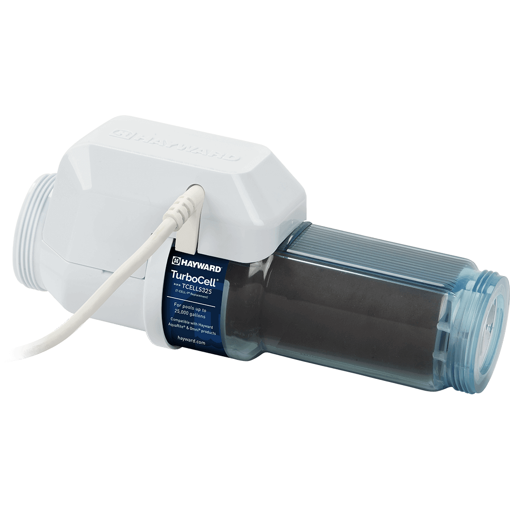 Angled left-facing view of the Hayward TurboCell S325 25k Clear Salt Cell, isolated on a transparent background, showing the white control housing positioned on the left with the embossed HAYWARD logo subtly raised across the top surface and a white power cable exiting from the upper left side and curving outward. The clear cylindrical salt cell chamber extends horizontally to the right, constructed from translucent light blue tinted plastic that reveals the dark internal titanium plates and ribbed internal structure. A navy blue product label centred on the housing reads “Hayward TurboCell TCELLS325” with “For pools up to 25,000 gallons” and compatibility details for AquaRite and Omni systems. White threaded union connections are visible at both ends, with the right side male threads clearly defined. The transparent background cleanly outlines the full silhouette of the salt chlorine generator cell without any solid backdrop.